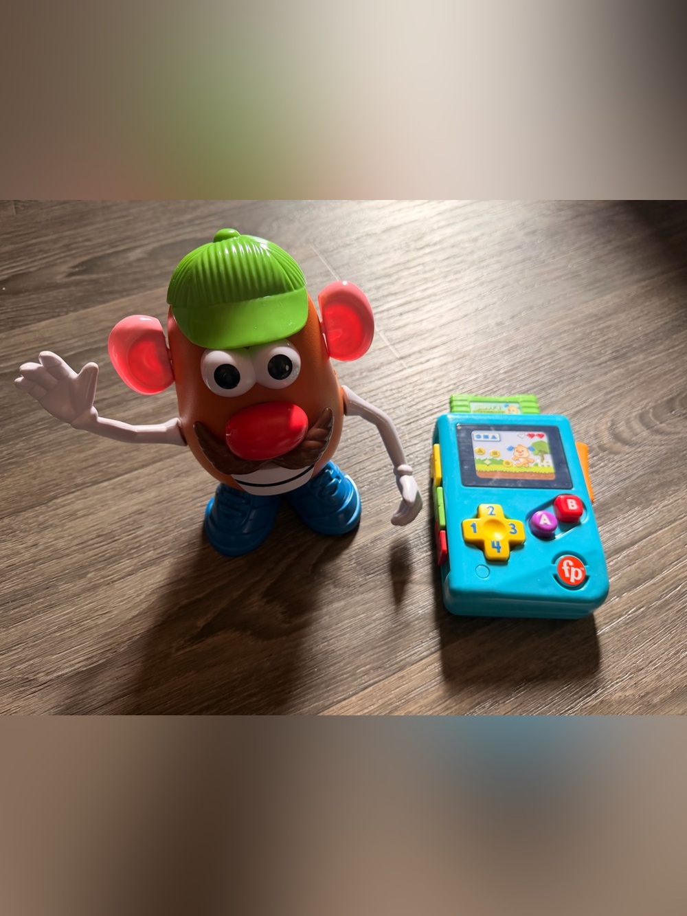 Mr. Potato head and game boy for baby